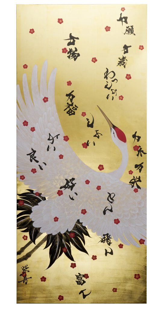 天を舞う鶴